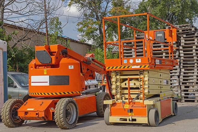 forklift carrying pallets in a warehouse in Cedarville